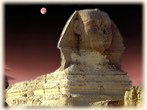 A sphinx statue in front of the moon.